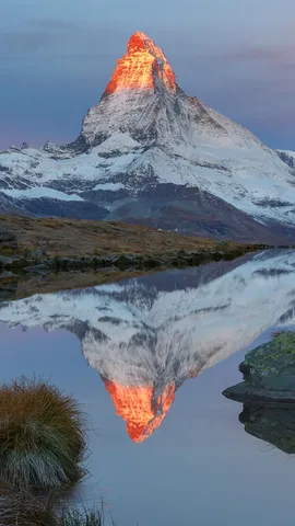 The Matterhorn reflected in Lake Stellisee at sunrise, Zermatt, Switzerland