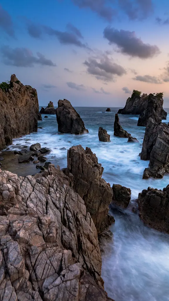 Rocks and rolling surf