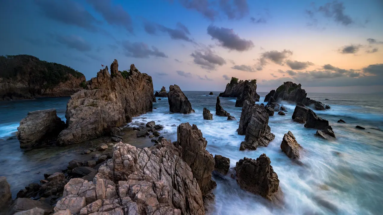Rocks and rolling surf