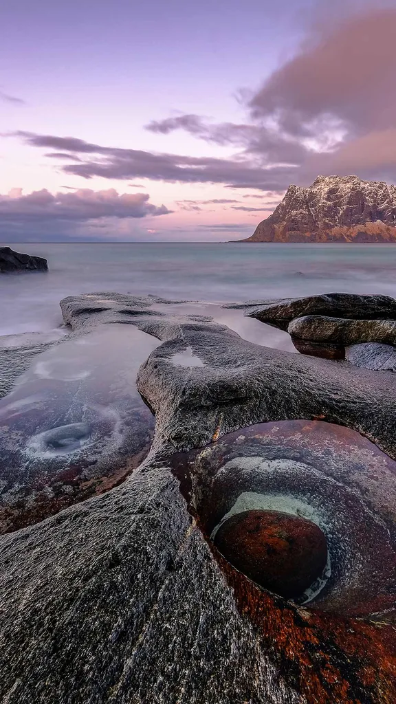 The Dragon's Eye rock formation at Uttakleiv Beach, Norway